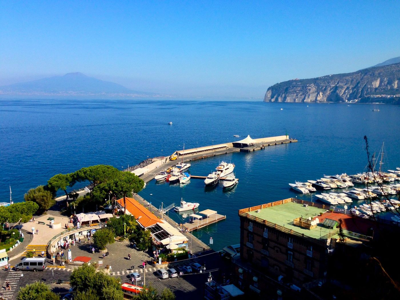 The Bay of Naples from Sorrento, with Vesuvius on the far shore and yachts in the harbour below
