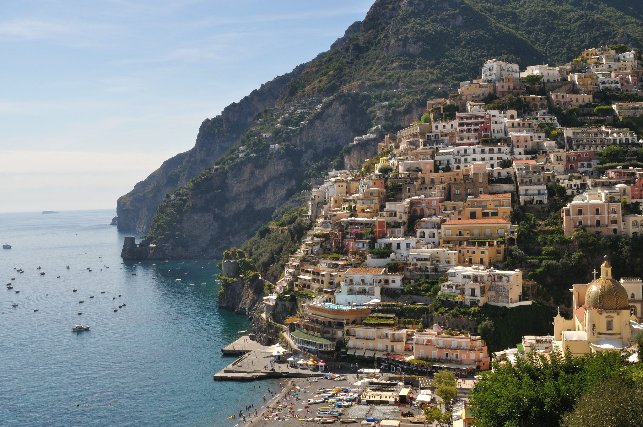 Positano's houses stacked up the cliffside above the sea on the Amalfi Coast